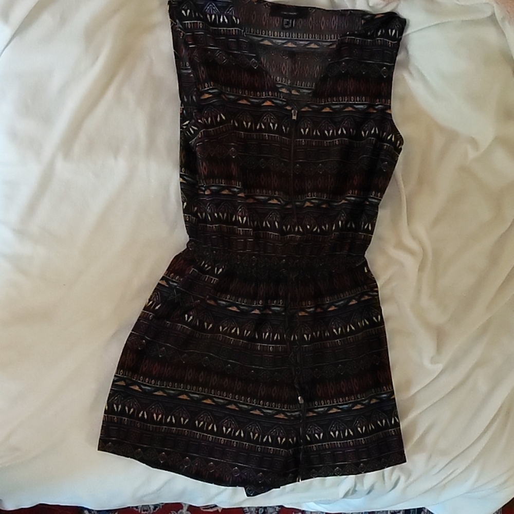 Purple romper with pockets